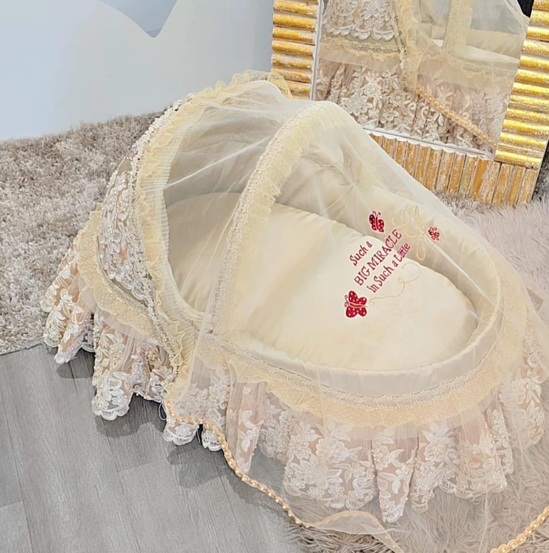 The Gold Bassinet The Empress Moses Basket: A Cradle of Pure Elegance